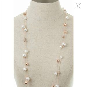 Long fireball illusion necklace by Ann Taylor